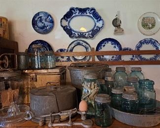 Many old canning jars and antique decor pieces
