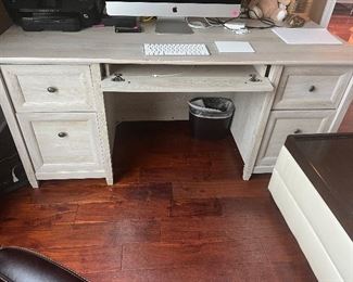 Desk with computer pull out ledge