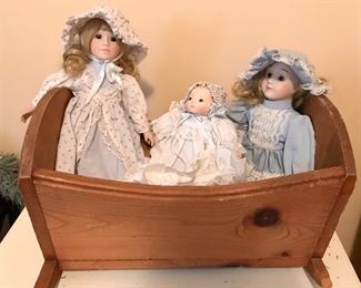 Porcelain Dolls and Toy Crib 