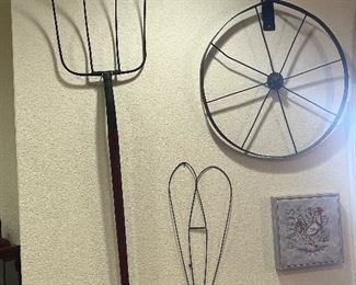 Antique hay fork, wheel and rug beater