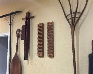 Antique threshing fork, cigar molds, seed planter