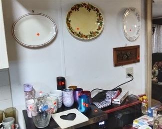 Mugs. platters, 2 of the 3 microwaves available