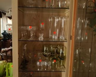 Glassware, including wine glasses, decanters, and tumblers