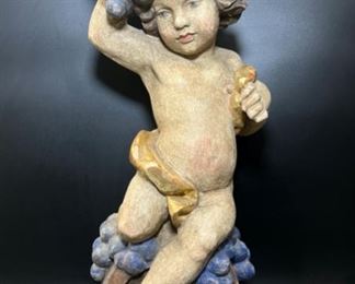 Vintage Hand Carved wood Putti Cherub Figure Bacchus Holding Grapes Seated on a Barrel