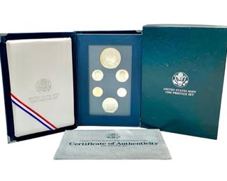 1990 US Prestige Proof Set With Eisenhower Centennial Commemorative Silver Dollar - The set includes proofs of a penny, nickel, dime, quarter, and half dollar struck at the San Francisco mint as well as a 26.73g .900 silver Eisenhower Centennial commemorative silver dollar struck at the Philadelphia mint. 