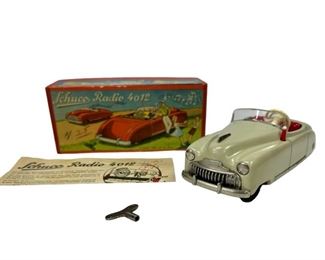 Antique German White Schuco Radio 4012 Wind Up Tin Car Toy w/ Thorens Musical Box *WORKING* - Schuco Looks to be in very good condition for its age. Everything is included box, manual, and original Schuco key.