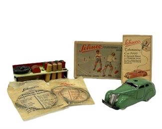 Antique German Schuco Telesteering Green Car 3000 Tin Toy Wind-Up Car - Car and everything that is present is in great condition. Missing a marker peg and key.