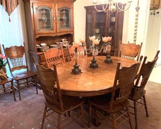 Oak dining table and 8 chairs set