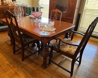 Early 1900's dining table, 6 chairs, sideboard, server, and china cabinet