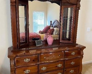 Queen bed w/ linens, side table, dresser, and armoire by Vaughan Bassett