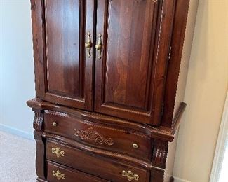 Queen bed w/ linens, side table, dresser, and armoire by Vaughan Bassett