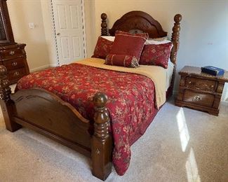 Queen bed w/ linens, side table, dresser, and armoire by Vaughan Bassett