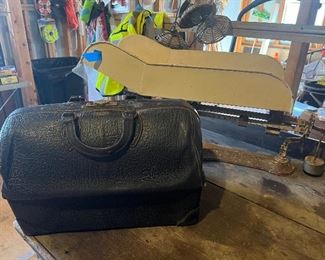 Original doctor's bag and baby scale belonging to local doctor, Dr. Joe Brown