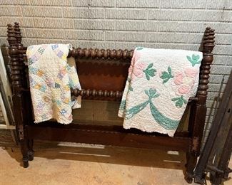 Antique double spool bed, quilts