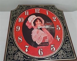 Coca-Cola clock. 11.5 x 15.5 in, plastic