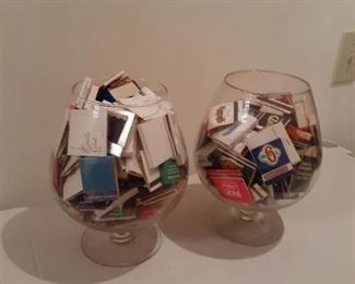 Matchbooks inside brandy sniffers