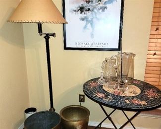 Garden table, copper and brass planters.  Glass pitchers, Michael Atkinson museum print