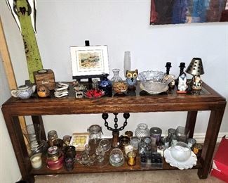 Entry Table - 2 angel statues, lots and lots of candles and candle holders