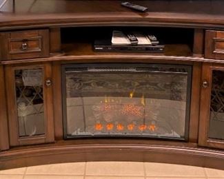 AWESOME BOSE SURROUND SOUND SYSTEM AND MULTI FUNCTION ELECTRIC FIREPLACE.