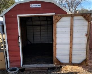 8X8X16 FOOT METAL BUILDING ON SKIDS. 8' WIDE 8' TALL 16' LONG.