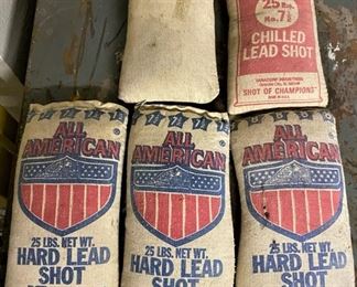 VINTAGE NEW OLD STOCK LAWRENCE BRAND NUMBER 7.5 SHOT CHILLED LEAD SHOT & VINTAGE ALL AMERICAN HARD LEAD SHOT 7.5 & 8 LEAD SHOT ALL FULL 25LB BAGS. ONLY 5 BAGS.