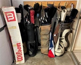 5 SETS OF GOLF CLUBS WITH ONE BEING STILL NEW IN BOX.