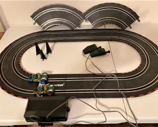 SWEET VINTAGE GERMAN MADE CARRERA RACETRACK WITH NINJA TURTLE DRIVERS. VERY FAST CARS.