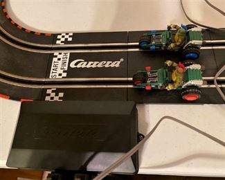 SWEET VINTAGE GERMAN MADE CARRERA RACETRACK WITH NINJA TURTLE DRIVERS. VERY FAST CARS.