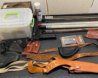 LOTS OF HOLSTERS AMMO AND MAGAZINES AND MORE.