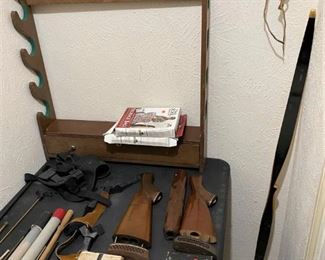 LOTS OF HOLSTERS AMMO AND MAGAZINES AND MORE.