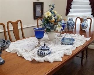 Dining table and 8 chairs. This beautiful table extends to approximately 10' with leaves.  It is in very good condition.