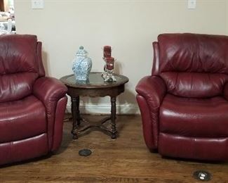 Two Leather rocker recliners. These chairs are excellent condition and very comfortable.