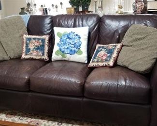 6' Leather sofa in good condition.