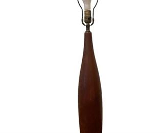 $300 USD      Tall Danish Mid Century Modern Turned Teak Lamp by ESA SK92-23      Description:  1960s sculptural turned teak Danish lamp by ESA. Features a counterweighted base to better support the tall form. Retains the brass insert on the underside bearing the 'ESA, Made in Denmark' manufacturer's mark.
Condition: Very good.  Some marks consistent with ag.
Dimensions: Teak base height: 23" Height to top of socket: 26.5" Height to top of harp: 36.35" Base diameter: 4.25".
Local pick up Bethesda, MD.  Contact us for shipper suggestions      https://goodbyhello.com/products/tall-danish-mid-century-modern-turned-teak-lamp-by-esa-sk92?_pos=2&_sid=8c0ac1cbb&_ss=r