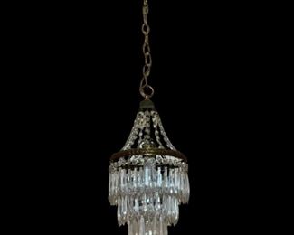 $225 USD     Early 20th Century Three Tier Icicle Drop Crystal Chandelier JB59-3      Description:  Gorgeous Ice Drop Vintage Crystal Chandelier.  Removed from a 1900 home in Washington, D.C. 
DETAILS + DIMENSIONS:17"H x 9"W
CONDITION: Please refer to photos for a more detailed look at condition. We make every attempt to list and photograph any defects or signs of wear that are significant to this sale.
Condition Desc. : Beautiful Condition
Local pick up only : Bethesda, MD.  Contact us for shipper suggestions.       https://goodbyhello.com/products/early-20th-century-three-tier-icicle-drop-crystal-chandelier-jb59-3?_pos=1&_sid=cc9362add&_ss=r