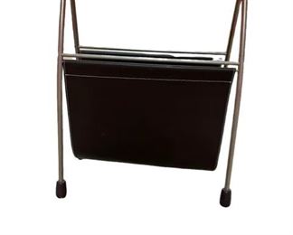 $100 USD       Mid Century Modern Leather and Chrome Sling Magazine Rack GL112-8      Mid-century Modern chrome and black leather sling magazine rack or record holder. The magazine rack or album/record holder is made of chrome metal and leather and is in  used, very good vintage condition for its age. Sleek and modern design. The perfect complement to your MCM side or lounge chair or your album display

DIMENSIONS: 16 x 7 x 20H

LOCATION: Local Pick Up Bethesda, MD. Contact us for shipper suggestions.      https://goodbyhello.com/products/mid-century-modern-leather-chrome-magazine-rack-gl108-8?_pos=1&_sid=61001ae50&_ss=r