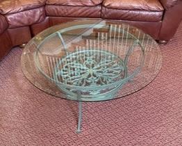 $210 USD     Round Glass Coffee Table with Green Wrought Iron Base LA178-27     Description: The iron design brings definition to the round glass adding just enough interest to a room without stealing all of the attention.  
Dimensions: 37.5 x 17"H
Condition: Very good condition
Local pick up Potomac, MD.  Located on first floor.  Contact us for shipper suggestions.     https://goodbyhello.com/products/la178-27?_pos=26&_sid=7cd389f6e&_ss=r