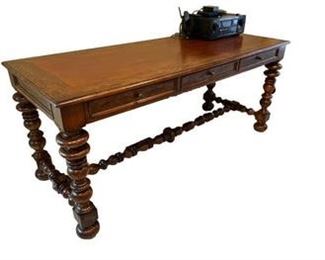 $3500 USD      Vanguard Louis VIII Style Wood Turned Leg Table/Desk LA178-20     Description: Tuscan-style writing table. Solid walnut. Handcrafted in Italy. Three drawers, center one with key lock. Turned legs. Turned stretcher. Distressed rustic finish. Antique brass hardware.
Dimensions: 70 x 28 x 30"H
Condition: Very good condition
Local pick up Potomac, MD.  Located on first floor.  Contact us for shipper suggestions.    https://goodbyhello.com/products/la178-20?_pos=28&_sid=7cd389f6e&_ss=r