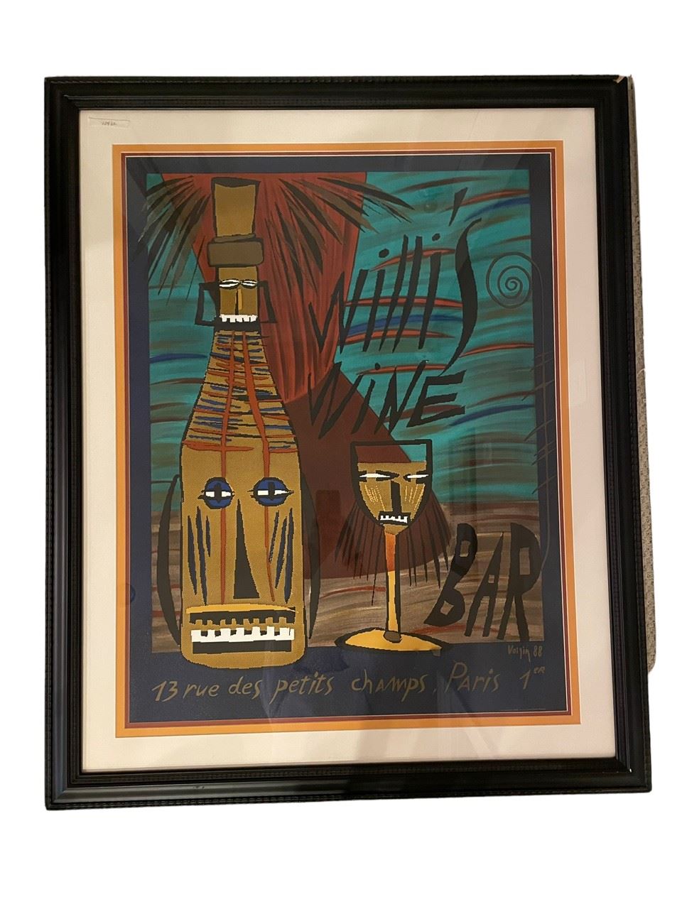 $125 USD     Vintage Art Deco Willi's Wine Bar Poster 13 Rue des Petits Champs. Paris LL52-10982    Description : A "Tiki" design typical of the 80s. Makes you want to go back to Tahiti! 
Condition Desc. : Beautifully framed.  Please refer to photos for a more detailed look at condition. We make every attempt to list and photograph any defects or signs of wear that are significant to this sale.
Measurements:  36 x 44"
Local pick up : Bethesda, MD.  Contact us for shipper suggestions.     https://goodbyhello.com/products/vintage-art-deco-willis-wine-bar-poster-13-rue-des-petits-champs-paris-ll52-10982?_pos=1&_sid=1d22691b8&_ss=r