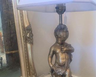 One of two cherub lamps