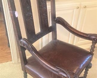 Host chair for the antique table