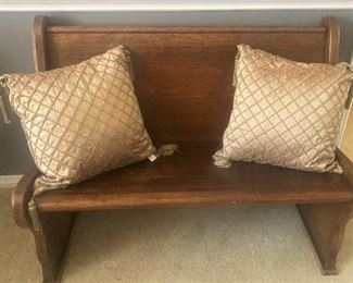 Antique bench; matching gold pillows