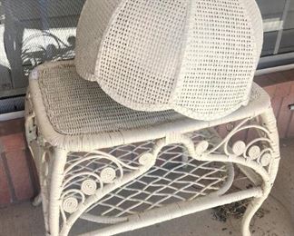 White wicker table and hanging light fixture