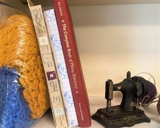 Sewing books; miniature machine