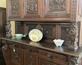 Sophistication abounds with this extraordinary antique buffet/sideboard.