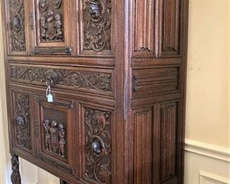 Exceptional antique cabinet with intricate carving