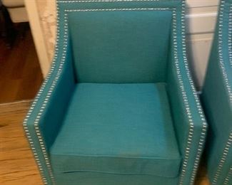Contemporary teal arm chairs go with ANY decor! The perfect POP of comfort and color.
