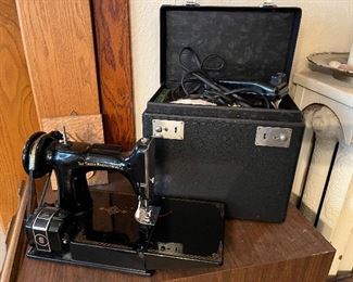 Featherweight Singer sewing machine with case