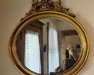 Gold framed eagle mirror