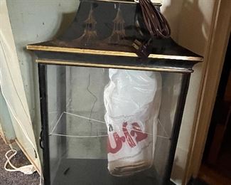 Lighted small wall hung curio cabinet